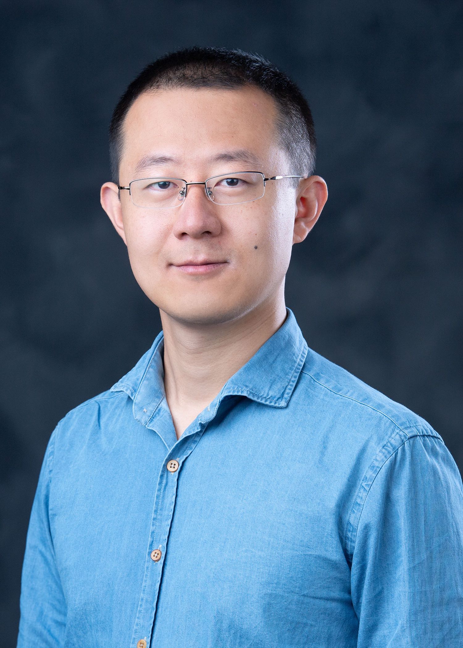 Professional portrait of Dr. Huan Cui