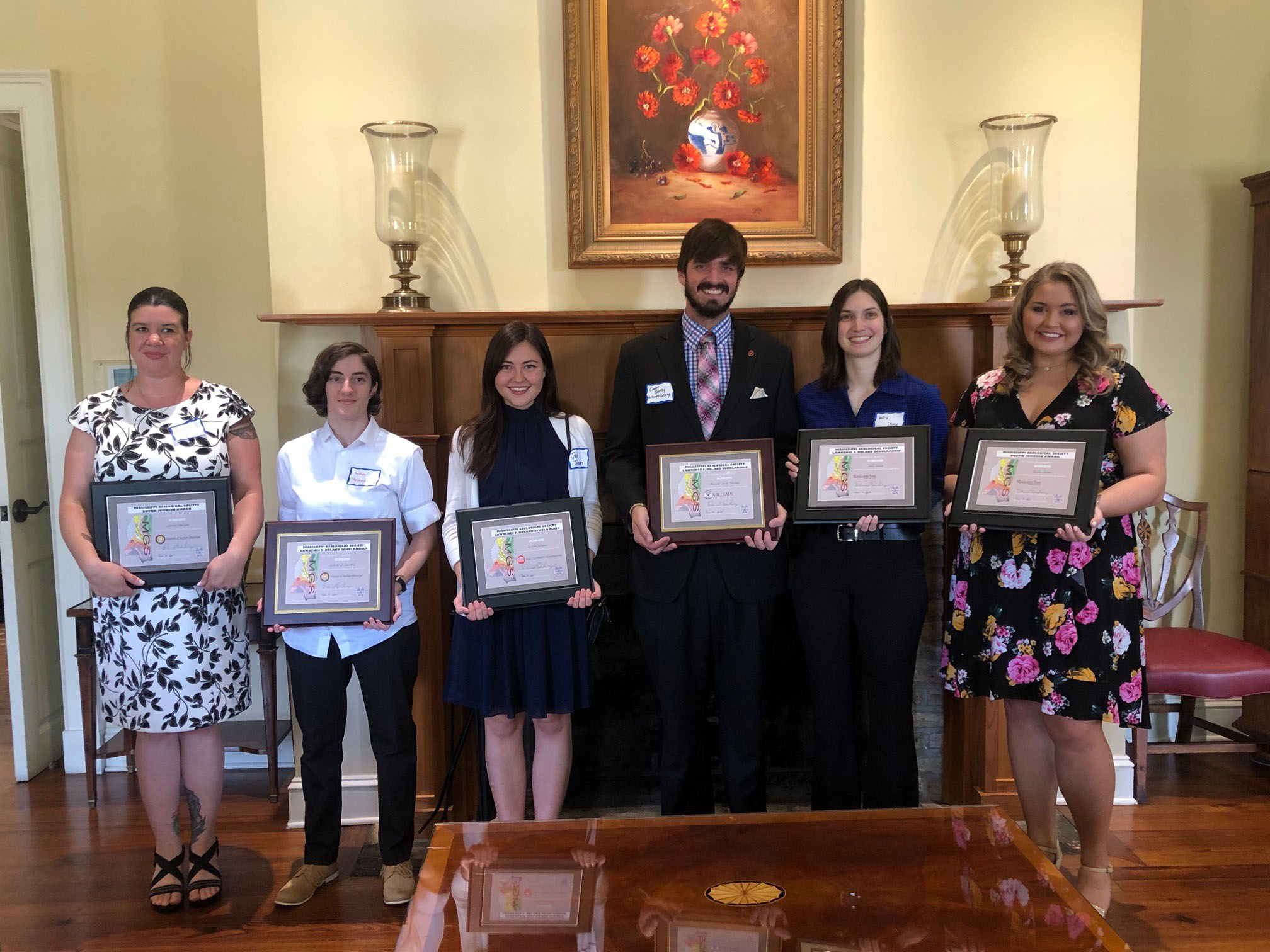 2019 Geological Society scholarship winners; Emily Welch (first from right) and Kelly Truax (second from right). 