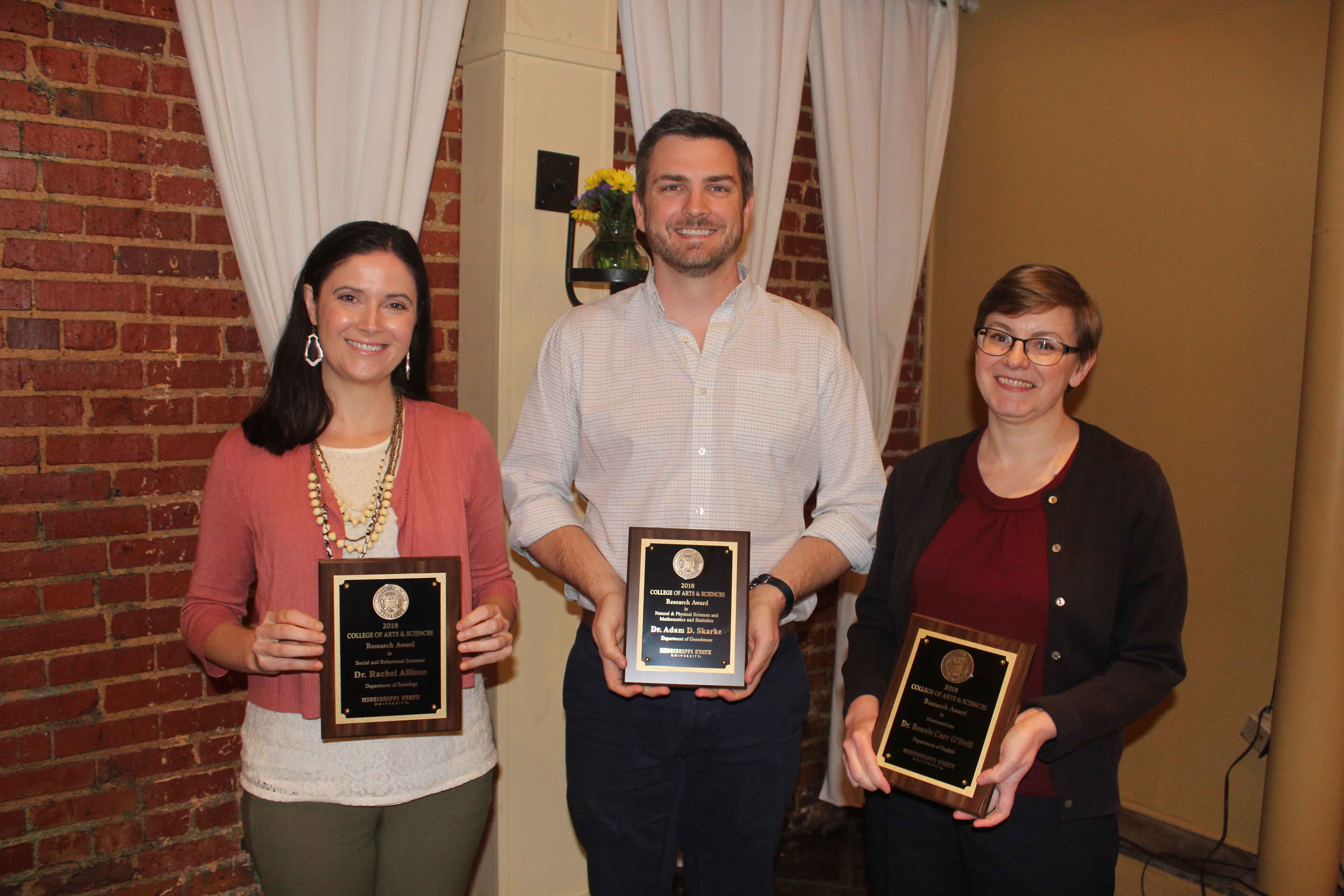 College of Arts & Sciences 2018 Research Award Recipients: Dr. Allison, Dr. Skarke (center), and Dr. O'Neill. 
