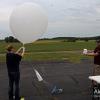  MSU meteorologists launching a weather balloon (April 2016). Photo by Alex Puckett.